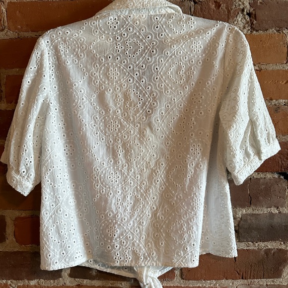White eyelet shirt. Front of shirt has a lining. Was purchased in Paris. - Picture 2 of 3